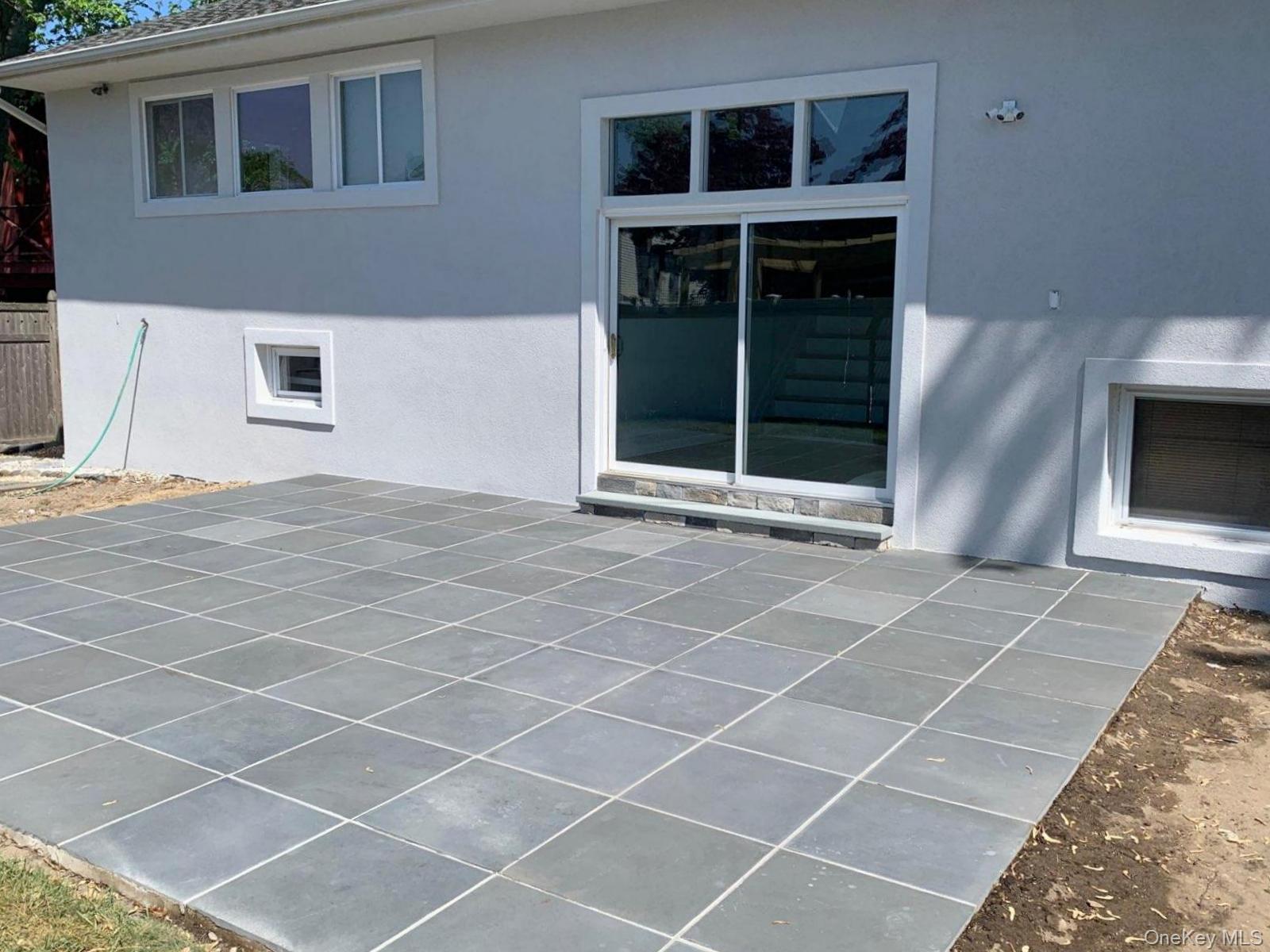 702 Fishermans Road Baldwin, NY 11510 - Photo 24 of 26 Brand new blue stone patio