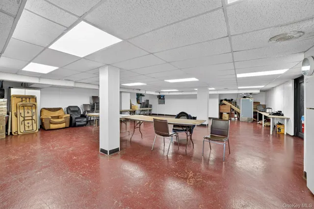 a kitchen with furniture and a table