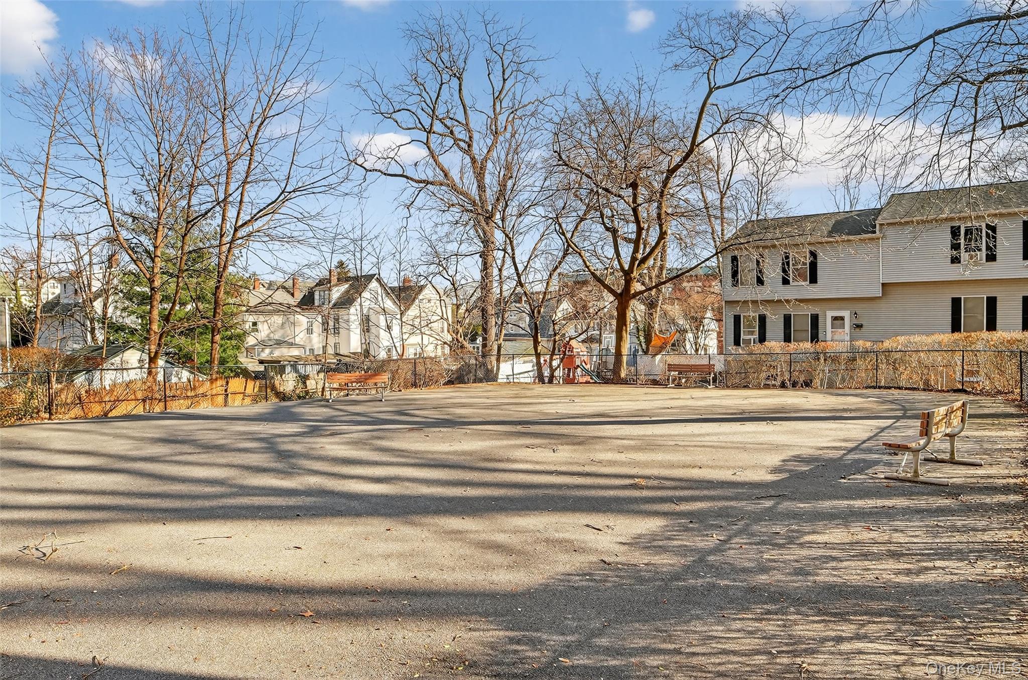 60 Locust Avenue, Unit 214A New Rochelle, NY 10801 - Photo 20 of 20 View of asphalt road with a residential view