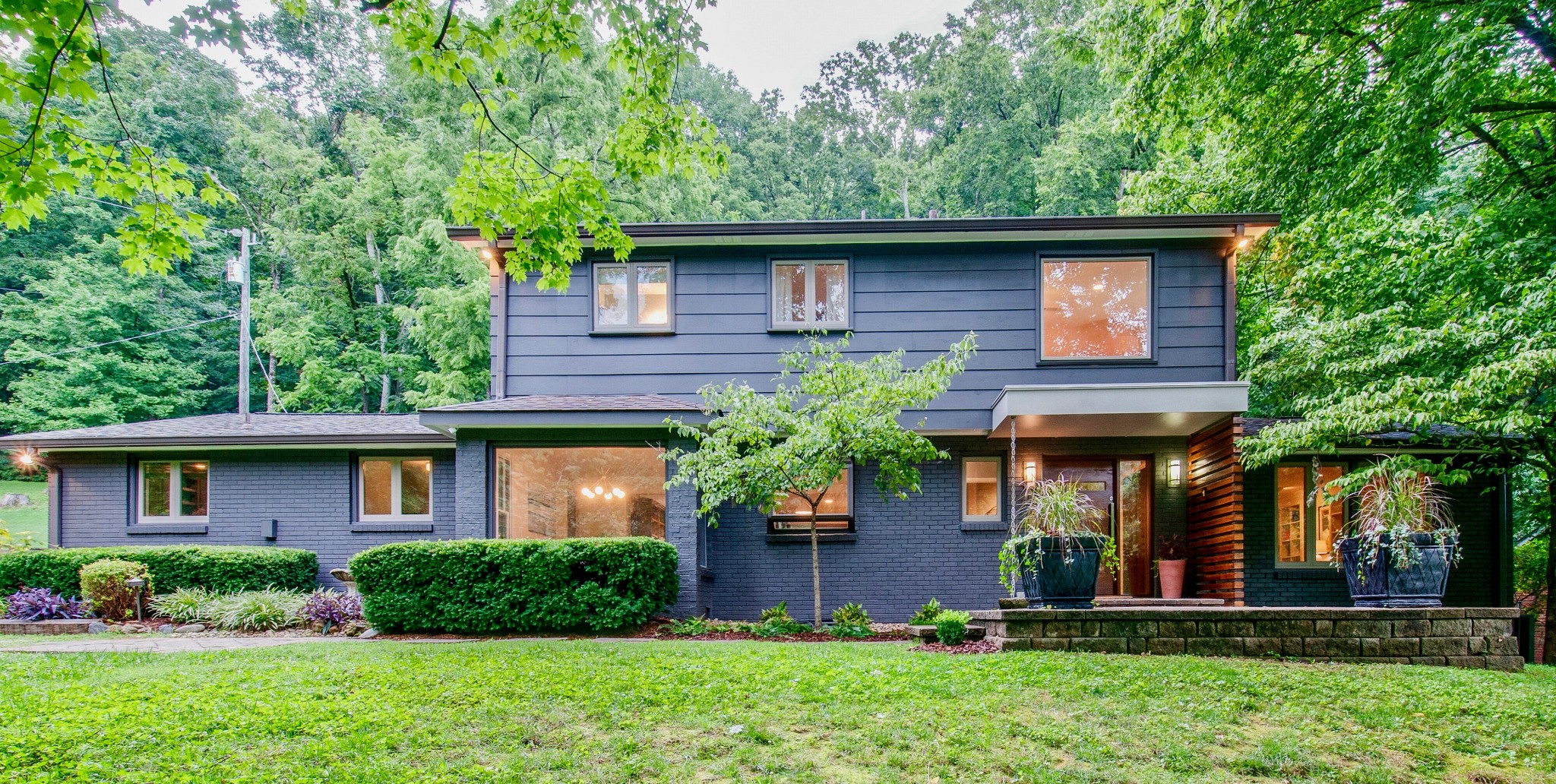 751 Rodney Drive Nashville, TN 37205 - Photo 1 of 50 a front view of a house with a yard