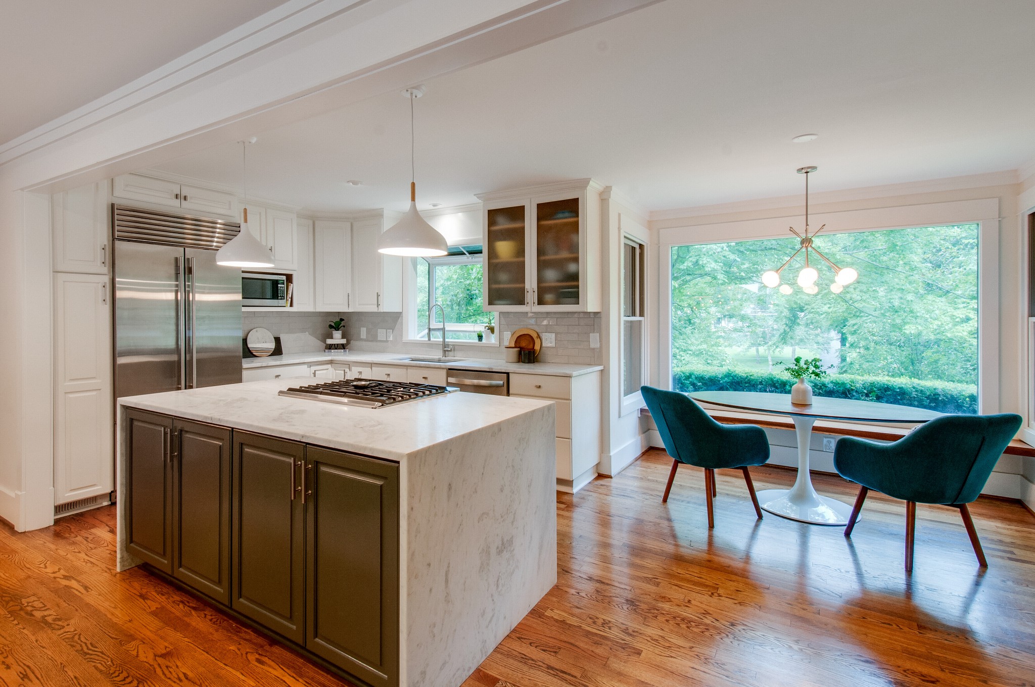 751 Rodney Drive Nashville, TN 37205 - Photo 13 of 50 a kitchen that has a stove and a table in it