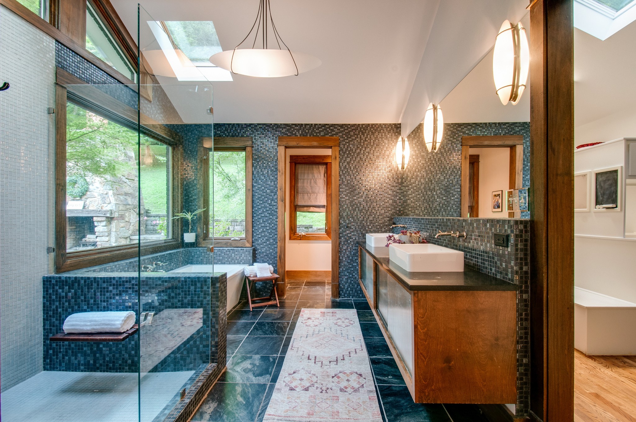 751 Rodney Drive Nashville, TN 37205 - Photo 22 of 50 a bathroom with a tub sink and mirror