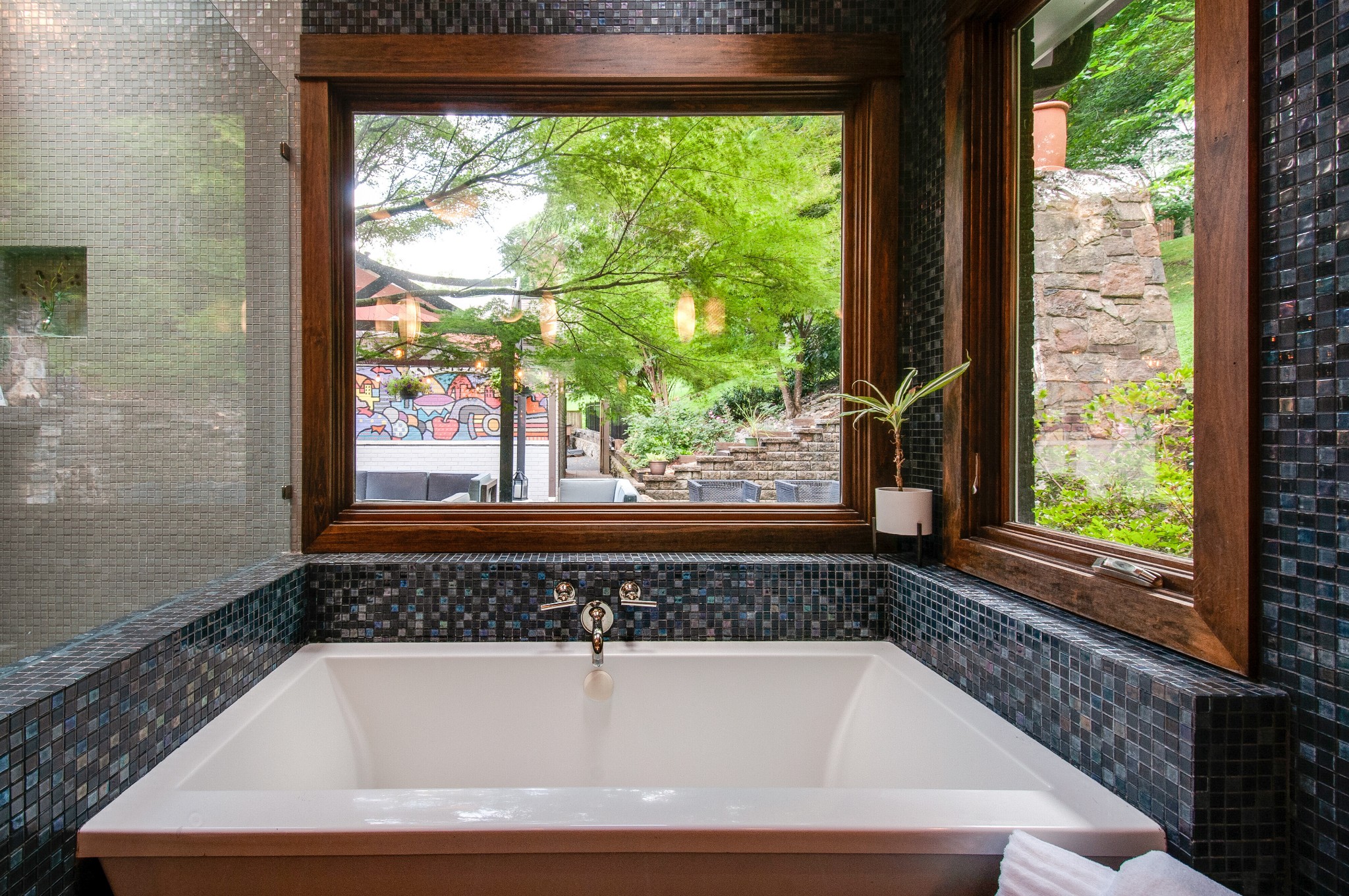 751 Rodney Drive Nashville, TN 37205 - Photo 25 of 50 a bathroom with a bathtub and window