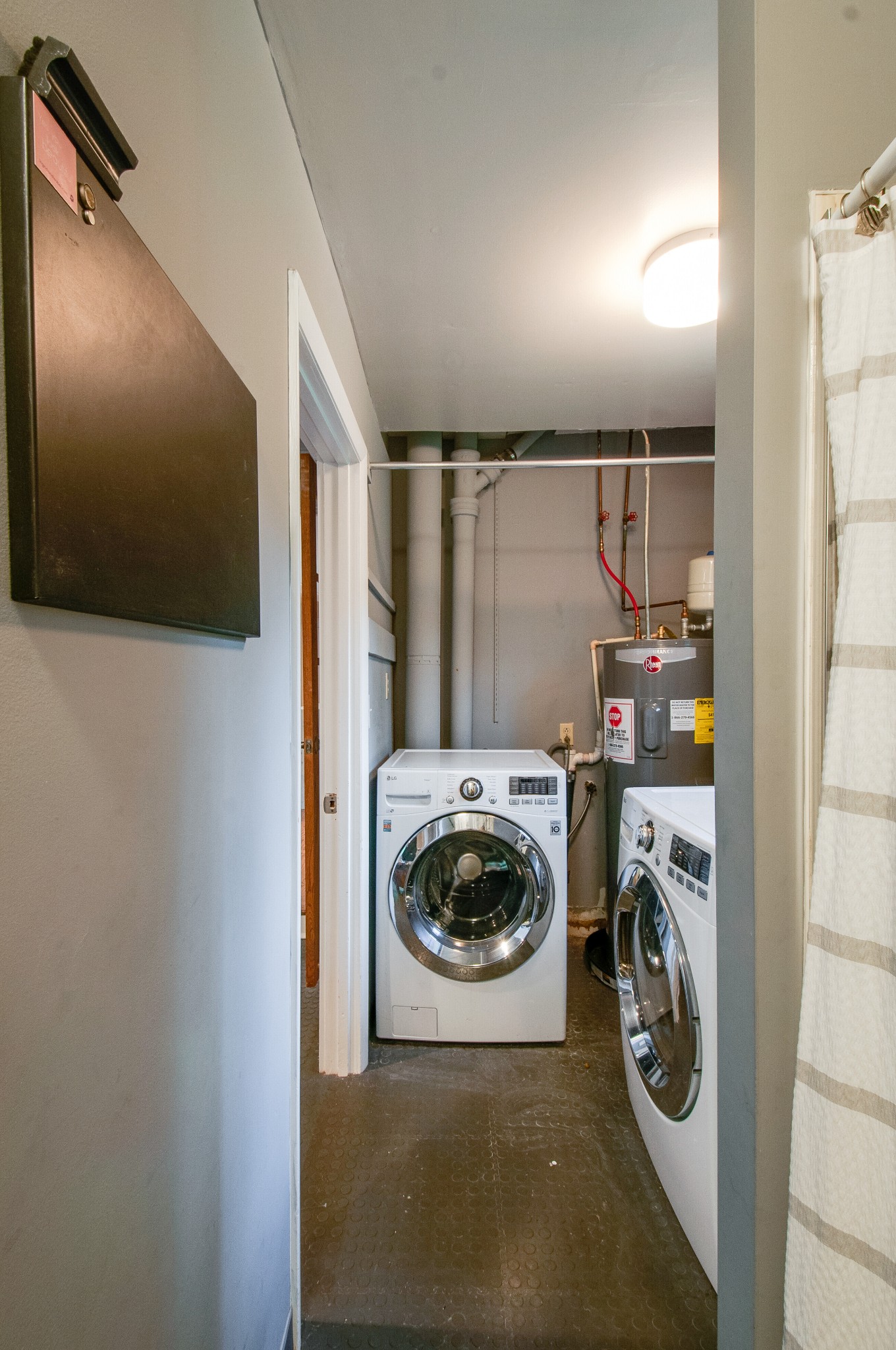 751 Rodney Drive Nashville, TN 37205 - Photo 31 of 50 a utility room with sink dryer and washer