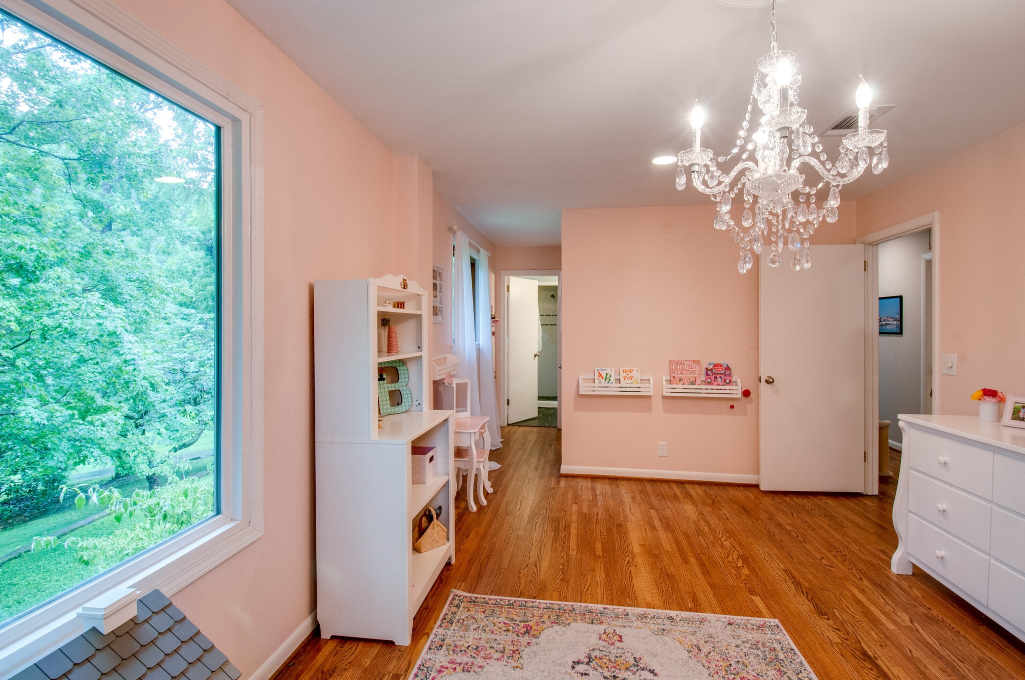 751 Rodney Drive Nashville, TN 37205 - Photo 33 of 50 a room with chandelier fan and wooden floor