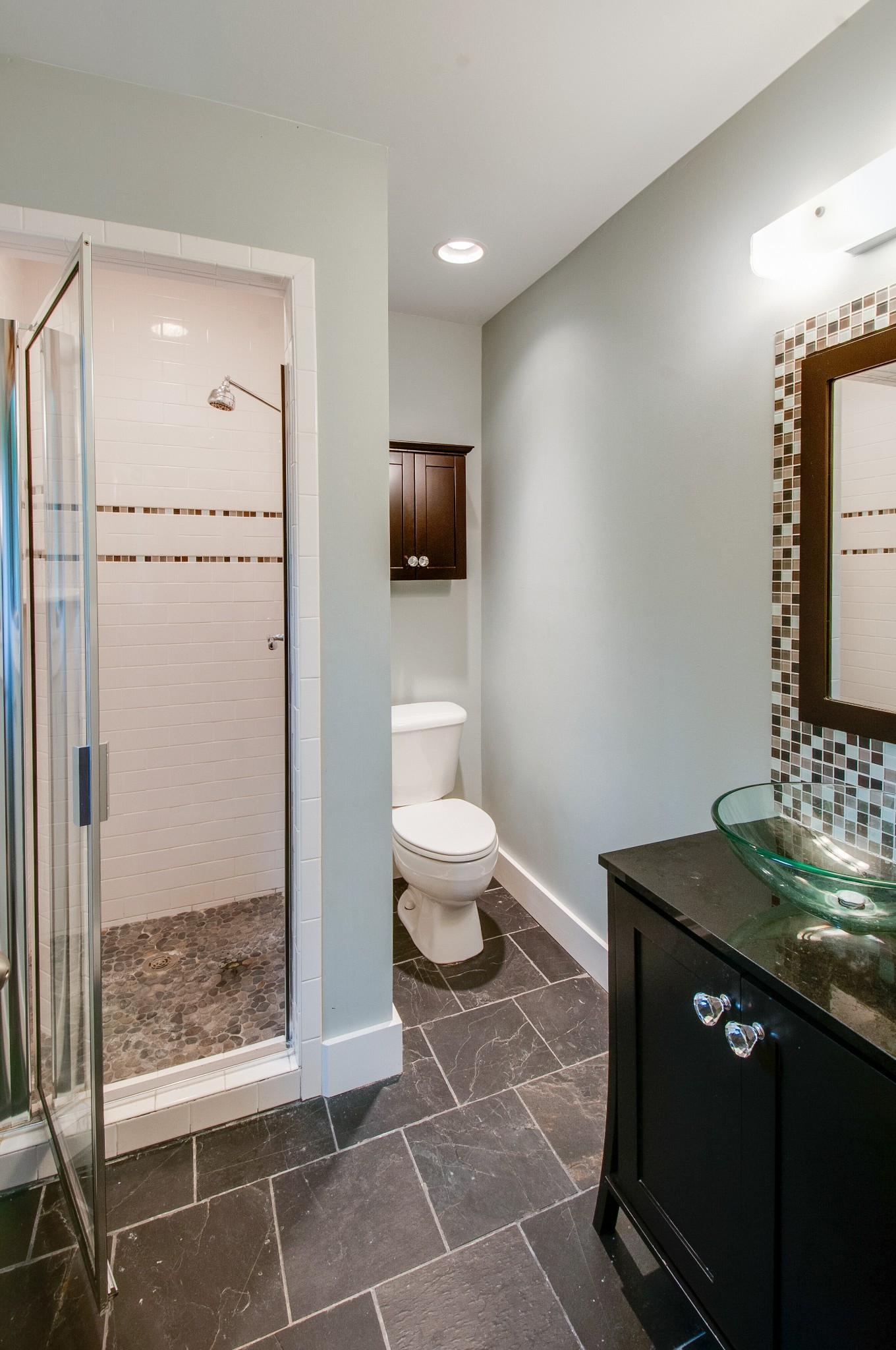 751 Rodney Drive Nashville, TN 37205 - Photo 35 of 50 a bathroom with a toilet a sink and mirror