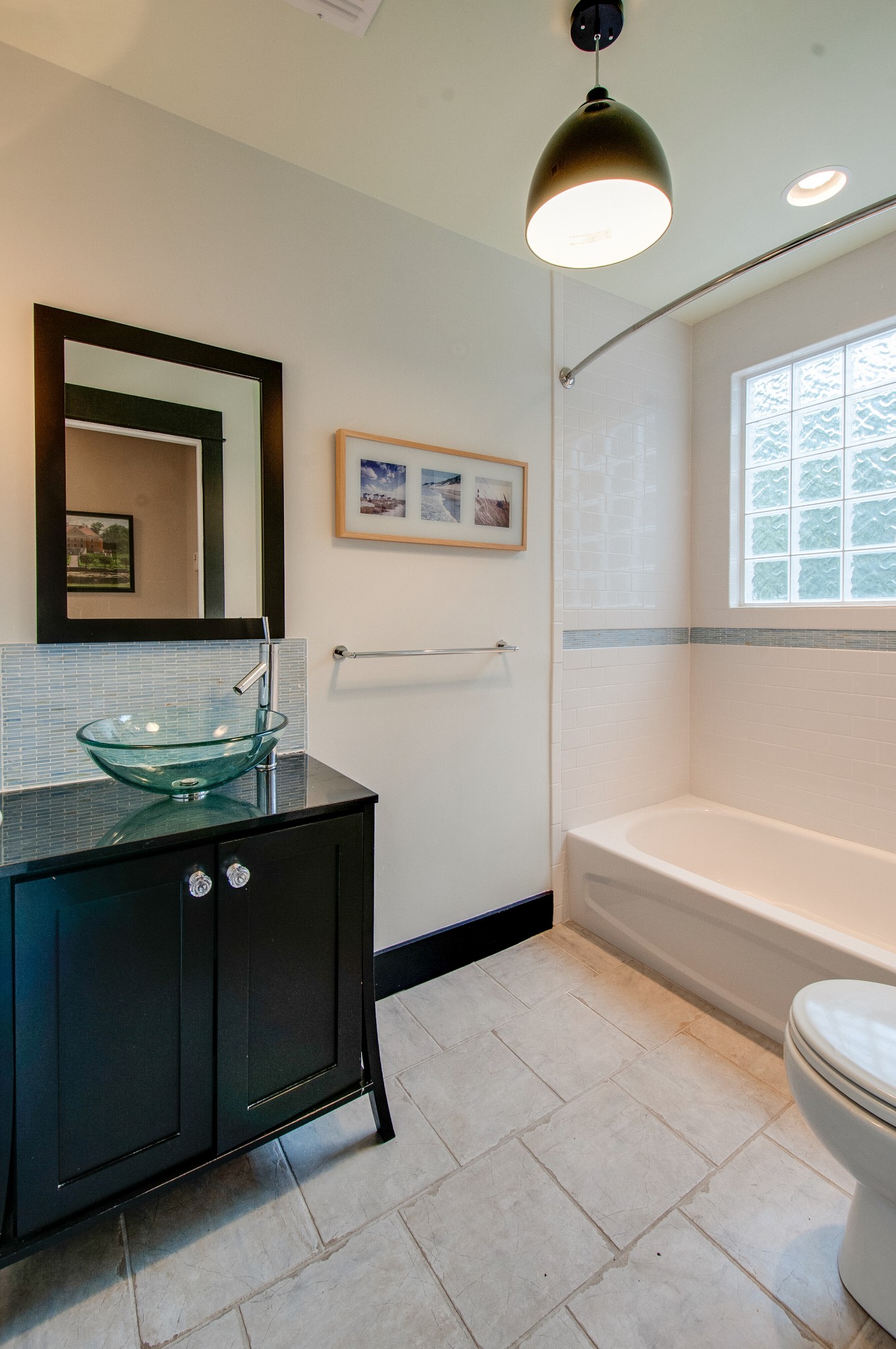 751 Rodney Drive Nashville, TN 37205 - Photo 39 of 50 a bathroom with a sink and a bathtub