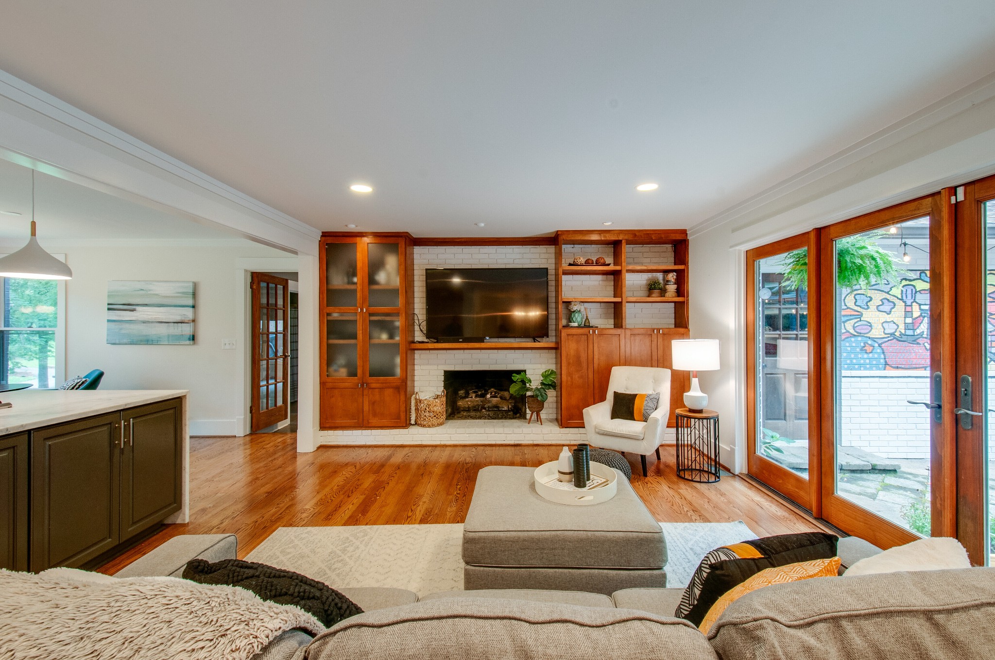 751 Rodney Drive Nashville, TN 37205 - Photo 8 of 50 a living room with furniture and a flat screen tv