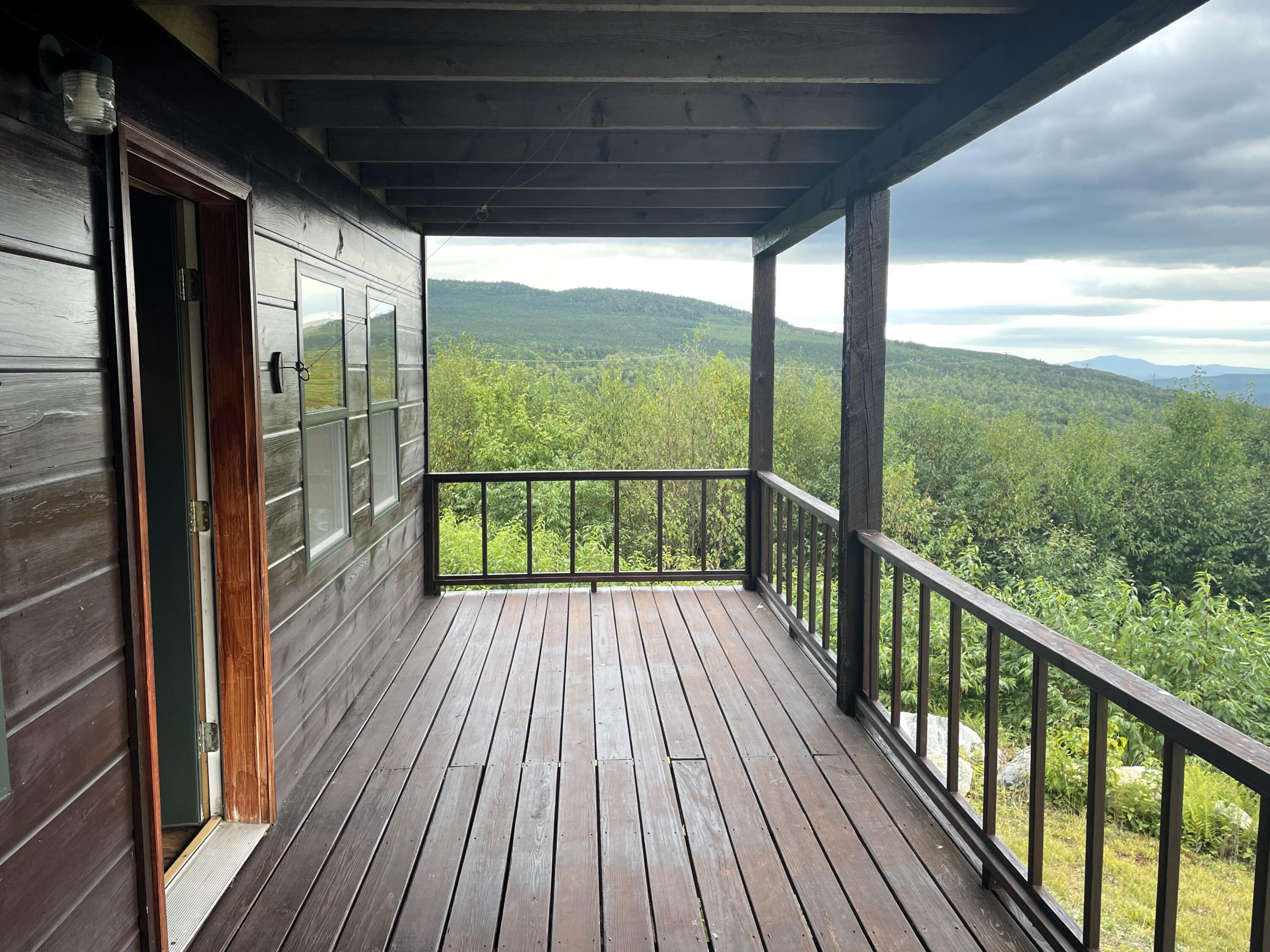 1261 Dirigo Road West Forks, ME 04985 - Photo 3 of 30 Thurber front porch