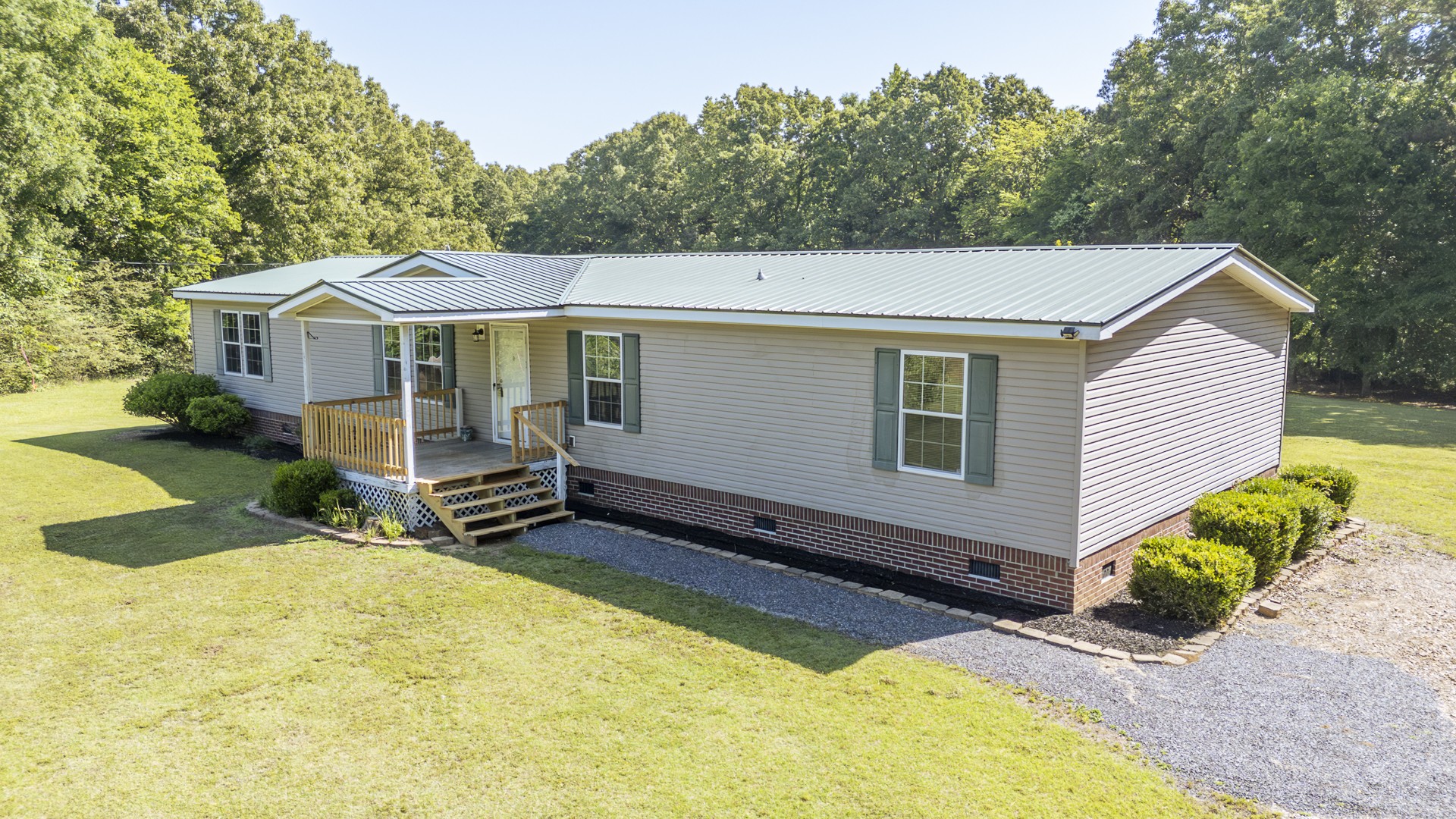 1125 Clifft Road Bolivar, TN 38008 - Photo 69 of 78 a view of a house with a backyard and sitting area