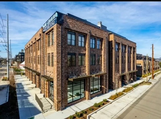 a view of a large building with wooden floor
