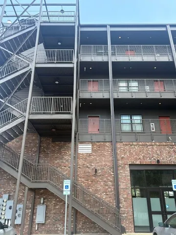 a view of a balcony with a window