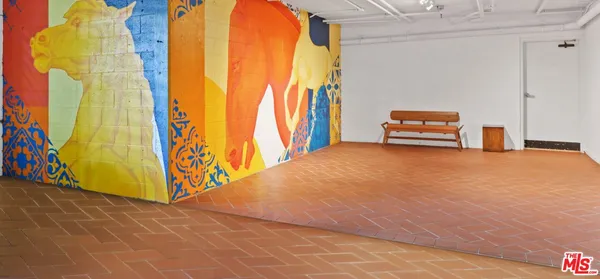 a view of a room with wooden walls