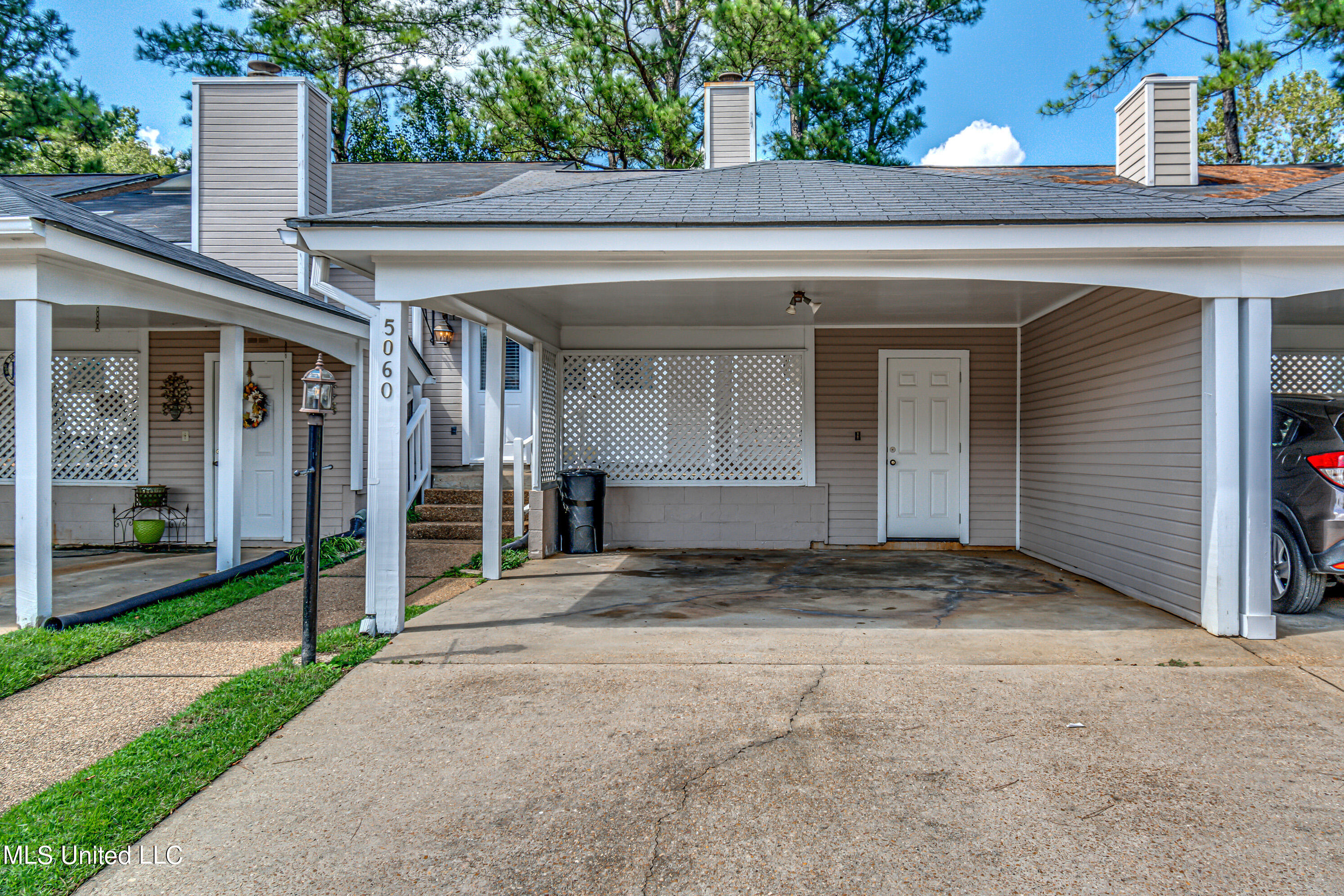 5060 Shadow Ridge Jackson, MS 39211 - Photo 6 of 32 2 car carport & storage room!