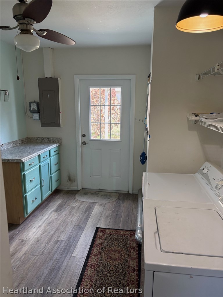 3913 Ferrari Drive Sebring, FL 33872 - Photo 13 of 20 a view of a storage & utility room with two washing machine
