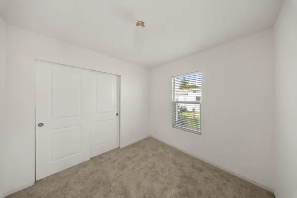 a view of a window in an empty room