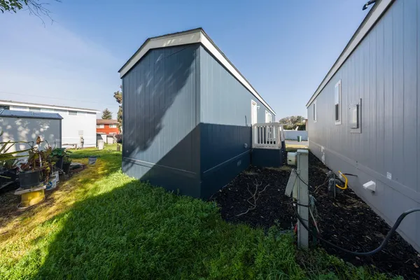 a backyard of a house with lots of green space