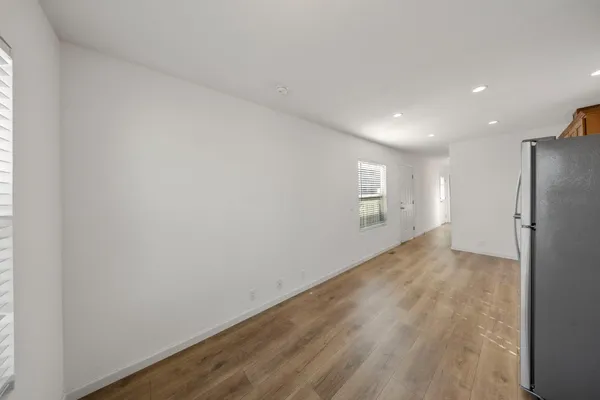 a view of an empty room and window