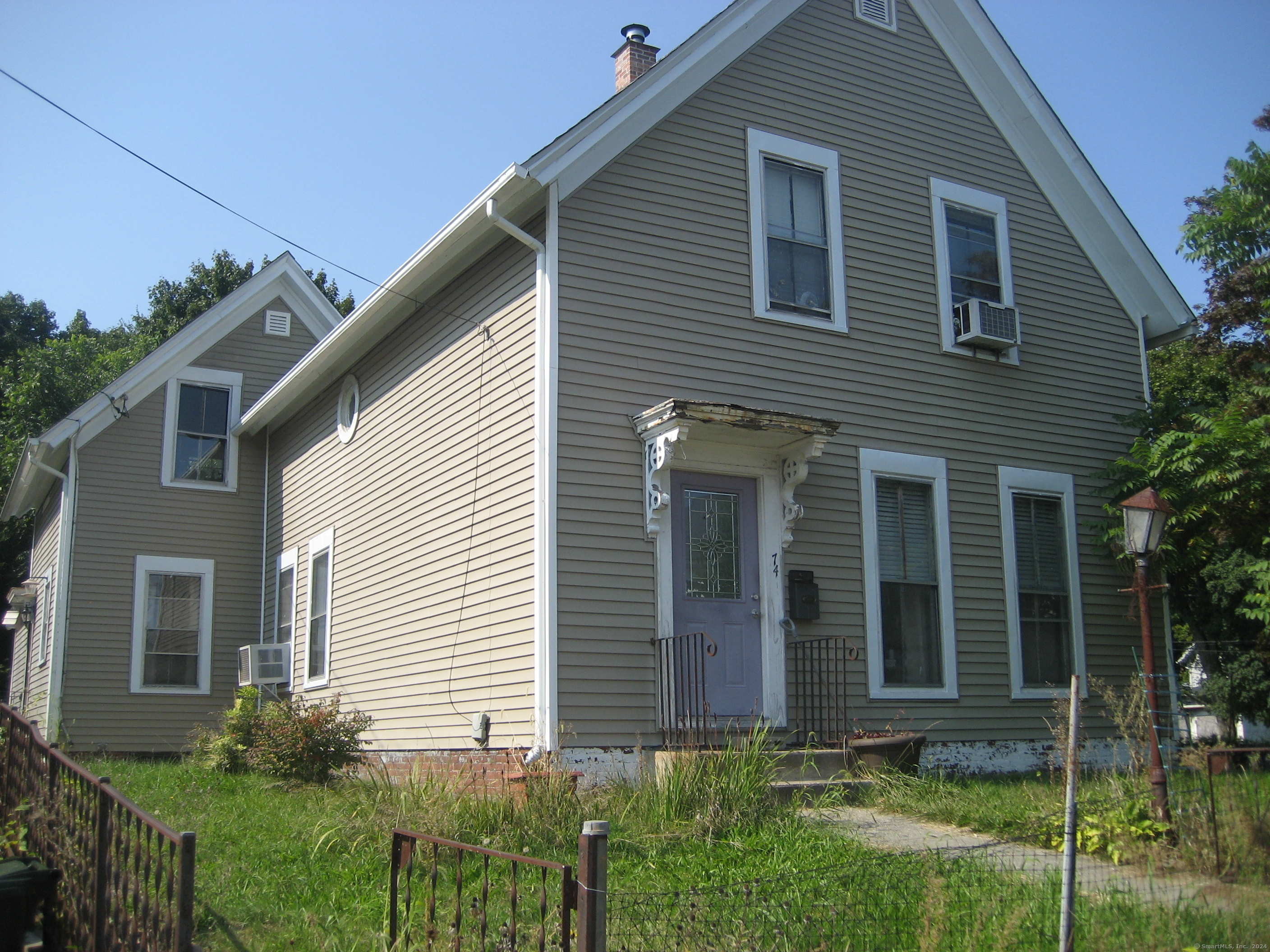 74 Prospect Street Norwich, CT 06360 - Photo 1 of 1 a view front of house with a yard
