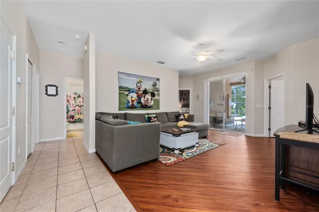 a bed room with a bed and a lamp