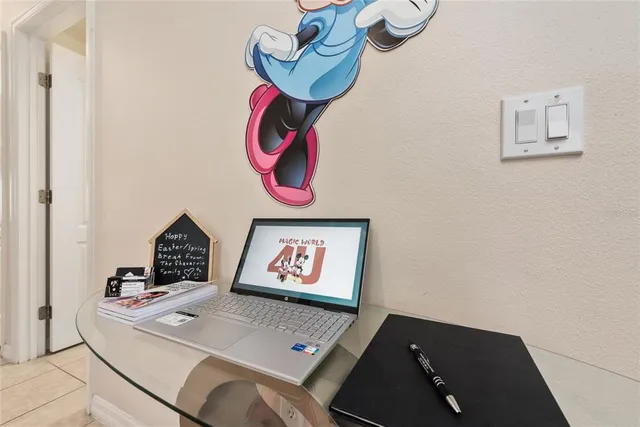 a bathroom with a toilet a sink and shower