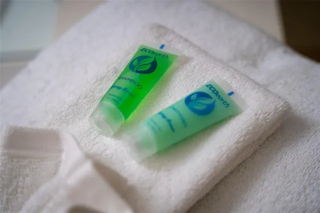 a room with furniture and a lamp