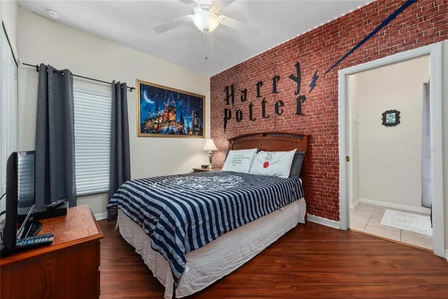 a view of swimming pool with seating area