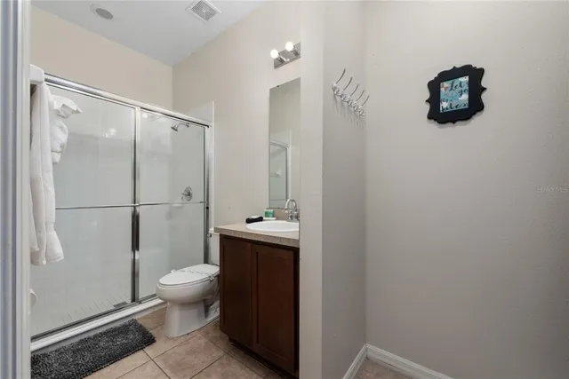 a view of a chairs and table in backyard