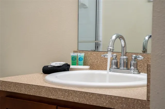 a room with furniture and pool table