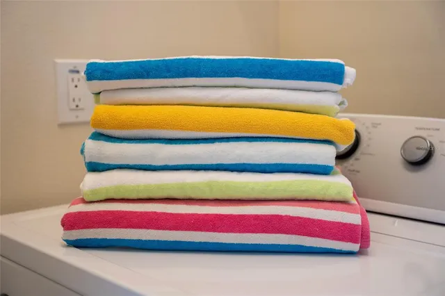 a view of a living room and kitchen