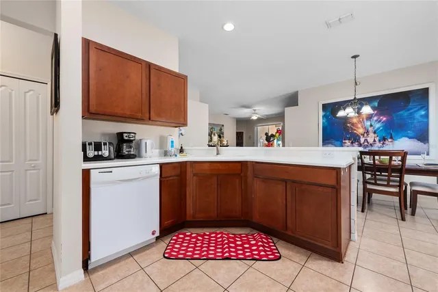 a room with lots of clutter and cabinets