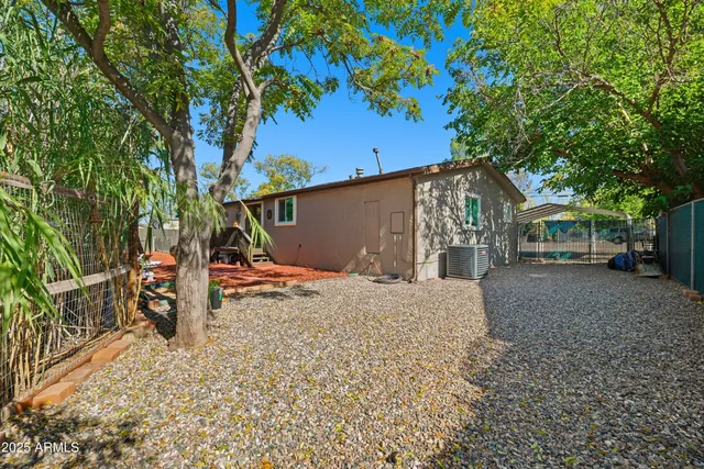 a view of a house with a tree