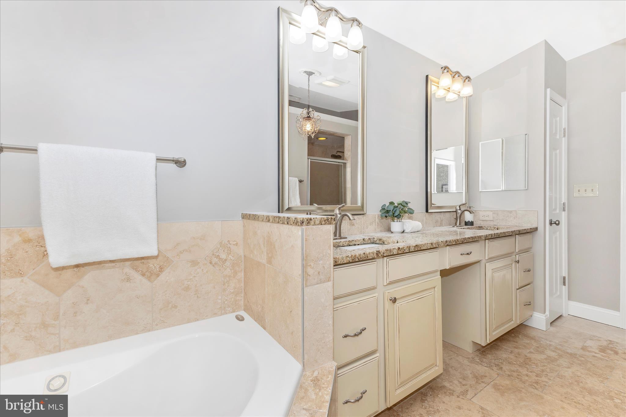 3919 Link Avenue Nottingham, MD 21236 - Photo 31 of 63 a bathroom with a granite countertop sink and a mirror