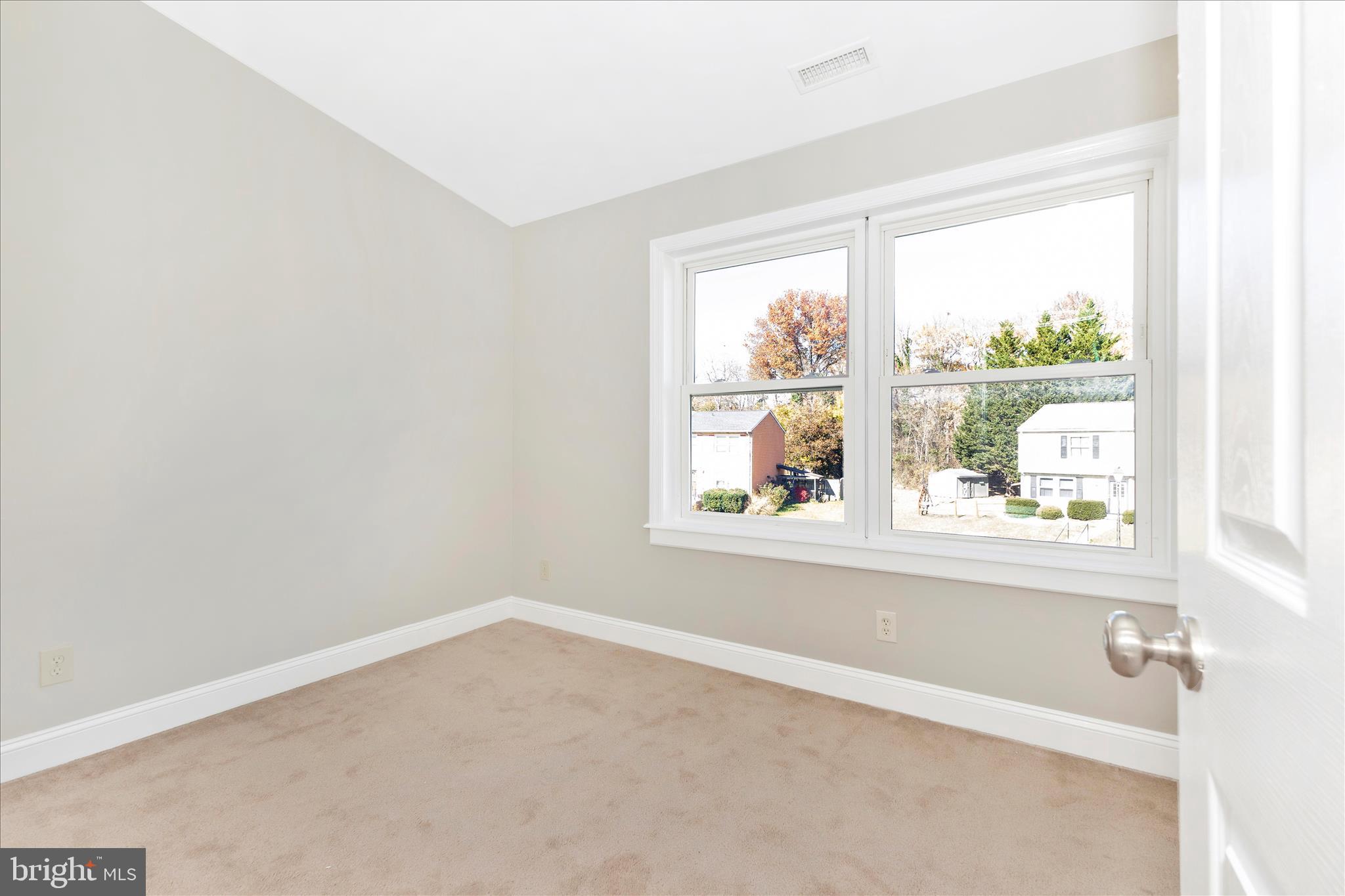 3919 Link Avenue Nottingham, MD 21236 - Photo 32 of 63 an empty room with a window