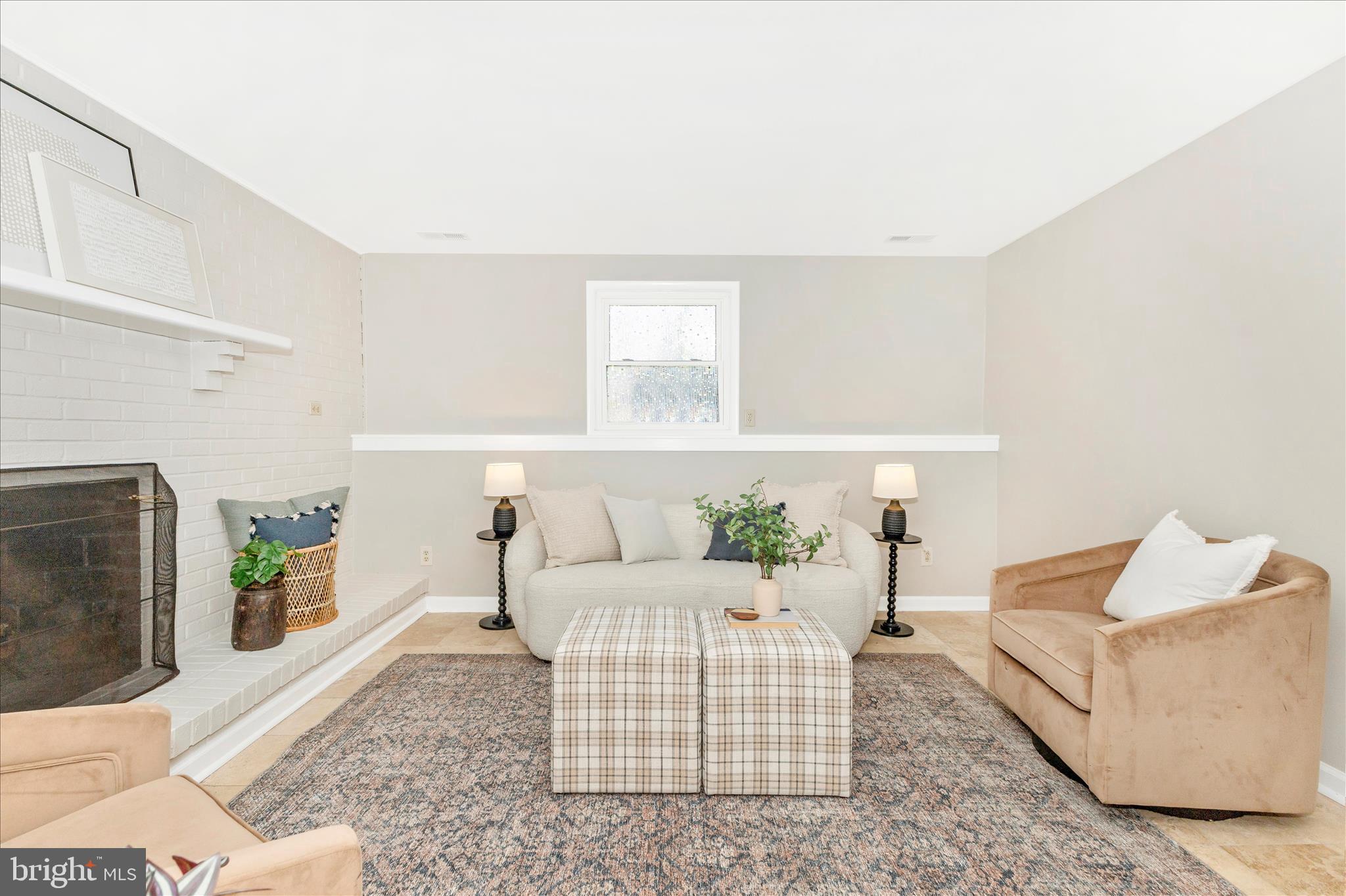 3919 Link Avenue Nottingham, MD 21236 - Photo 34 of 63 a living room with furniture and a fireplace
