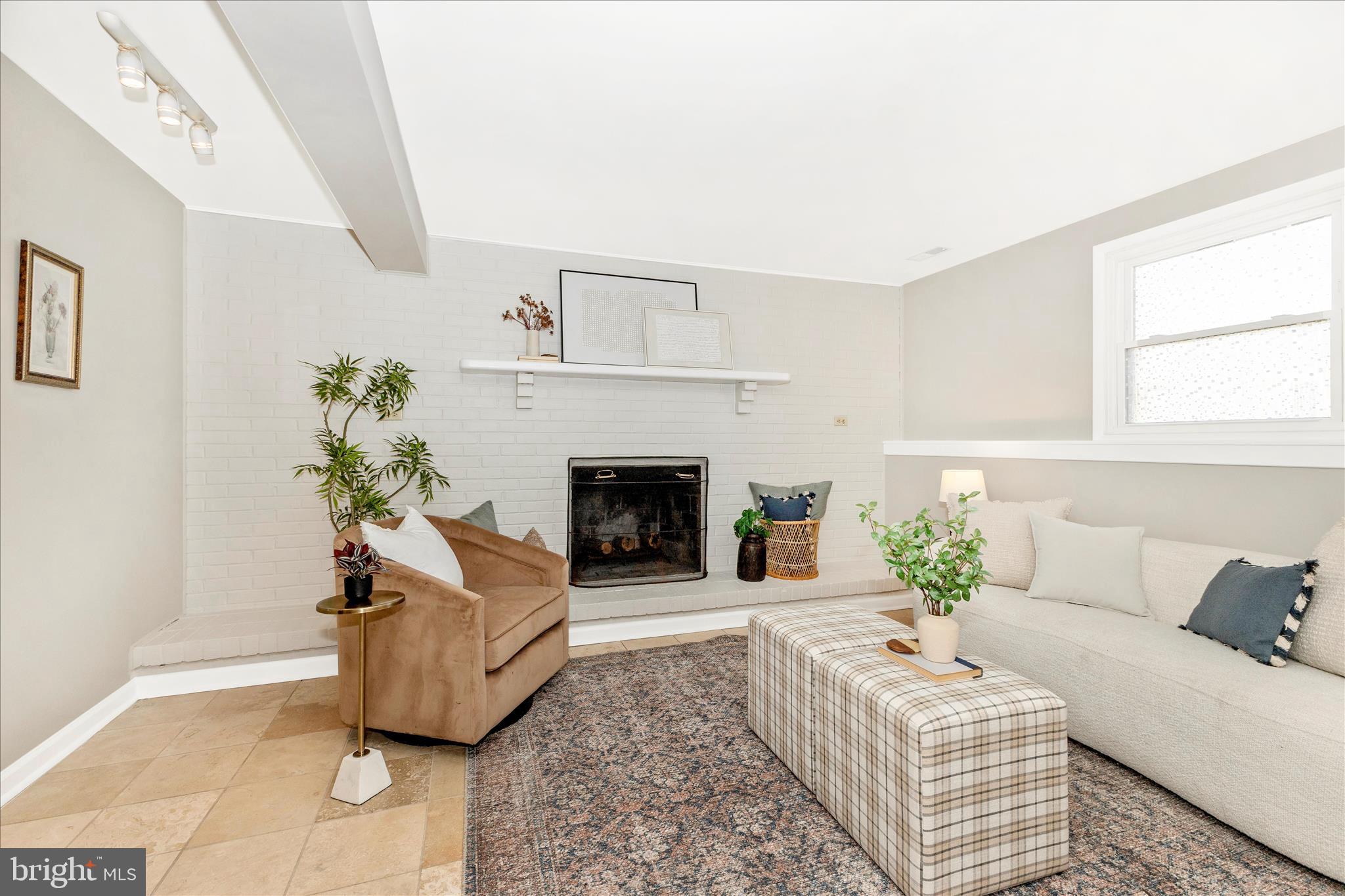 3919 Link Avenue Nottingham, MD 21236 - Photo 35 of 63 a living room with furniture and a fireplace
