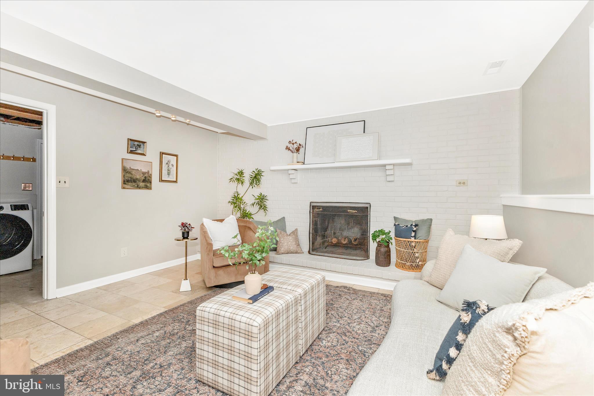 3919 Link Avenue Nottingham, MD 21236 - Photo 36 of 63 a living room with furniture and a fireplace