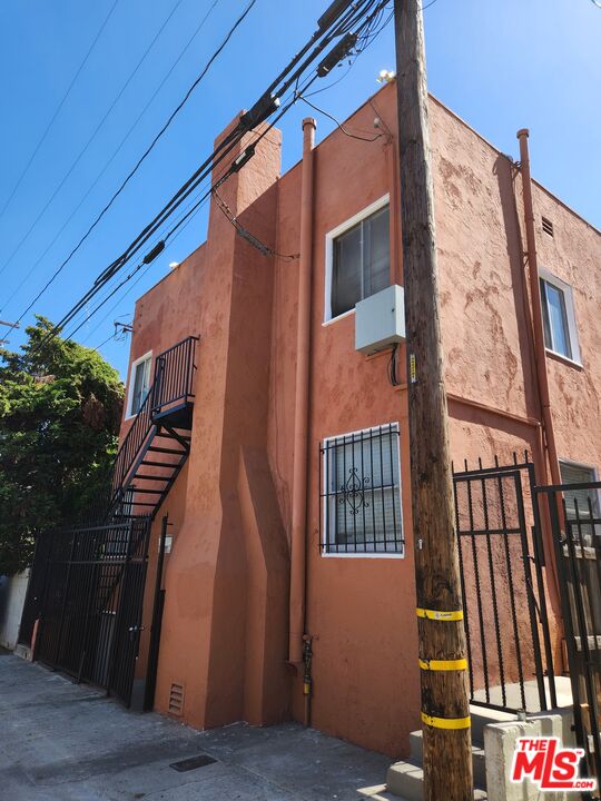 1217 Cedar Avenue Long Beach, CA 90813 - Photo 4 of 15 a view of balcony with wooden floor and outdoor space