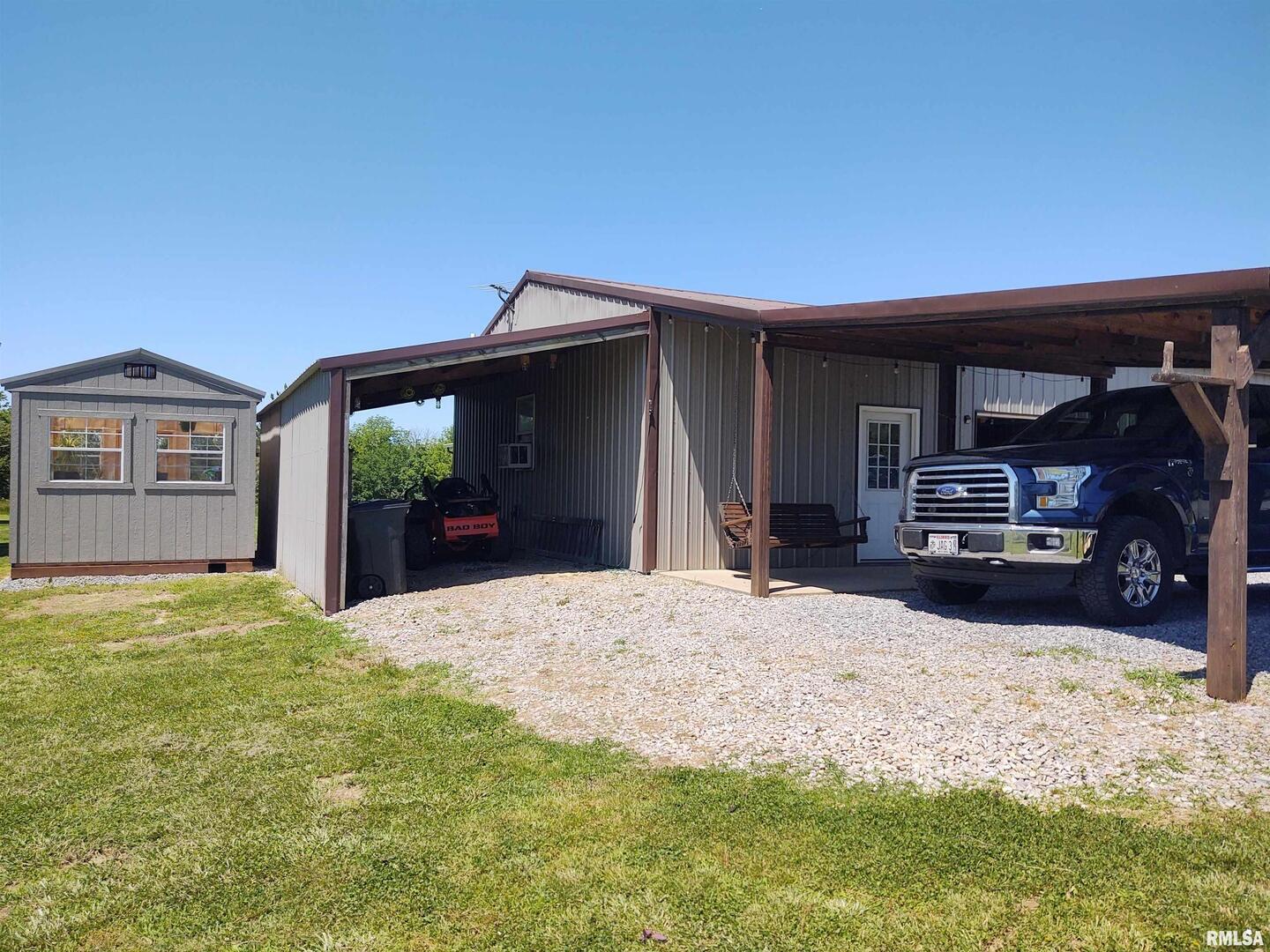 1640 Pleasant Ridge Road Vienna, IL 62995 - Photo 52 of 77 a view of a house with a yard