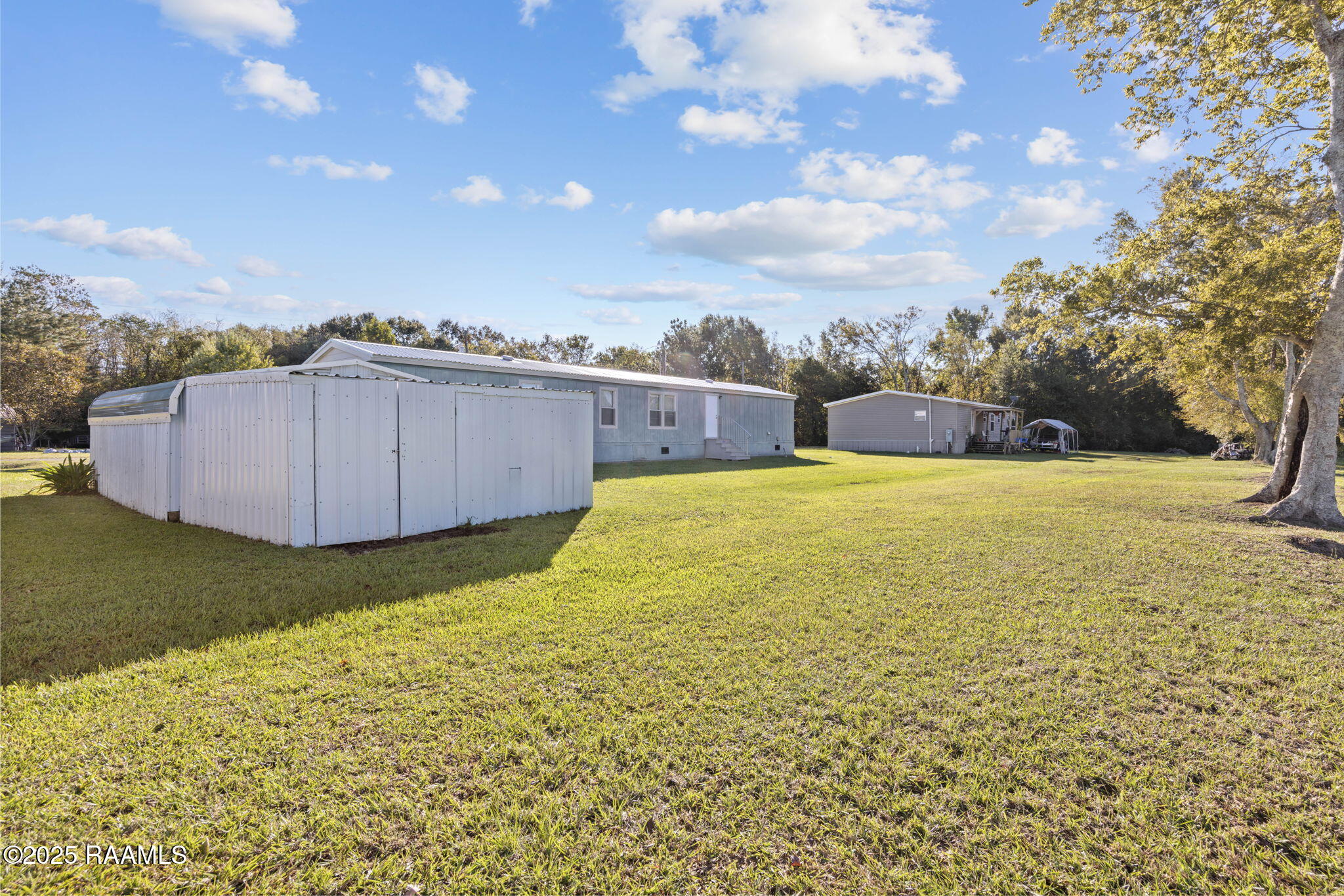 1097 Kidder-Robin Road, Unit F Arnaudville, LA 70512 - Photo 23 of 27 Storage Shed 2