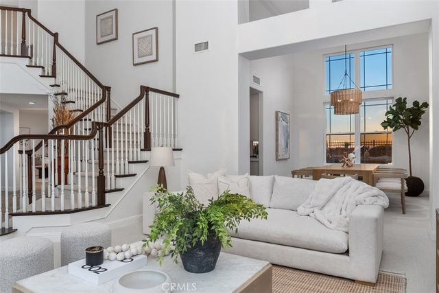 a dining room with table and chairs