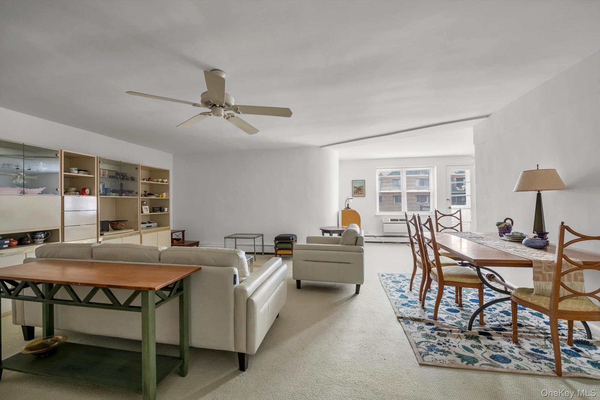 25 Chapel Place, Unit 3N Great Neck, NY 11021 - Photo 7 of 23 a view of a dining room with furniture