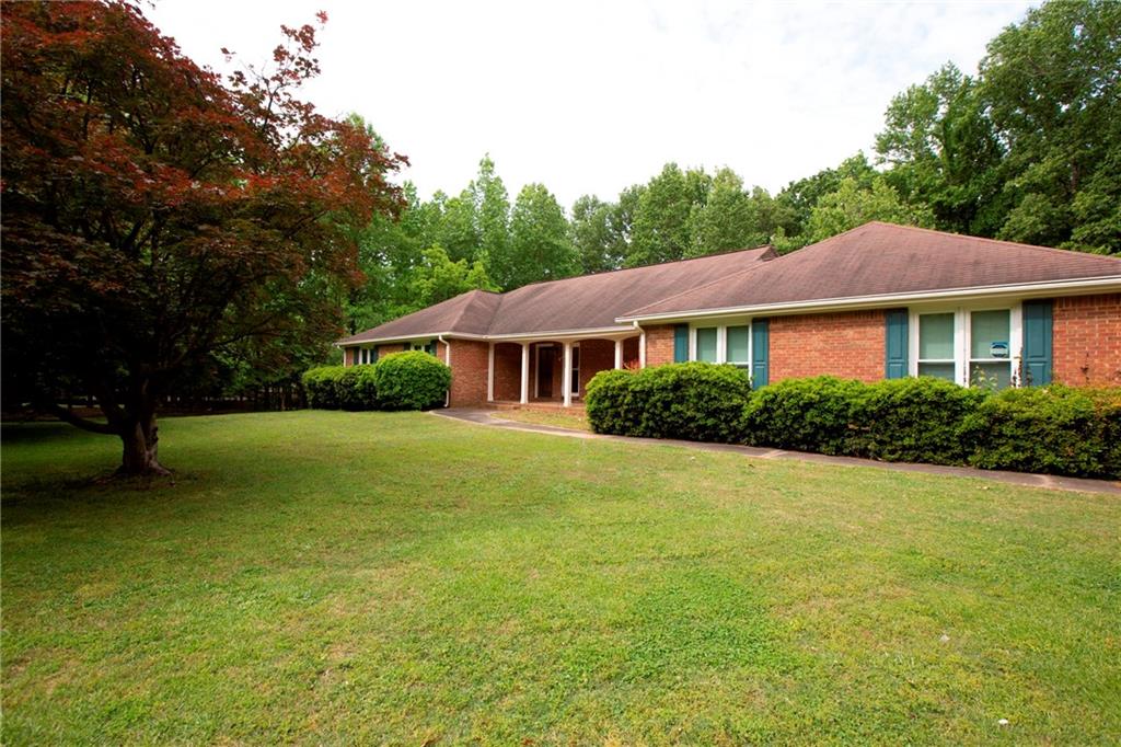 11640 Houze Road Roswell, GA 30076 - Photo 1 of 1 Solid brick, large front yard.