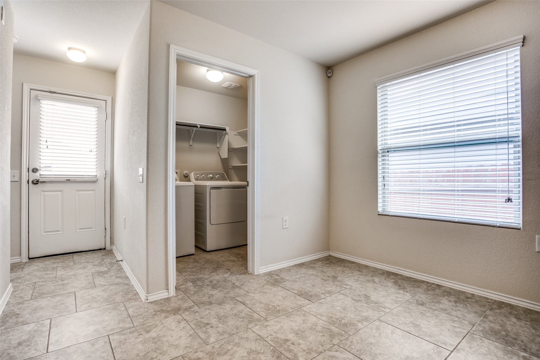 3605 Alpine Autumn Drive Austin, TX 78744 - Photo 13 of 25 an empty room with windows and closet