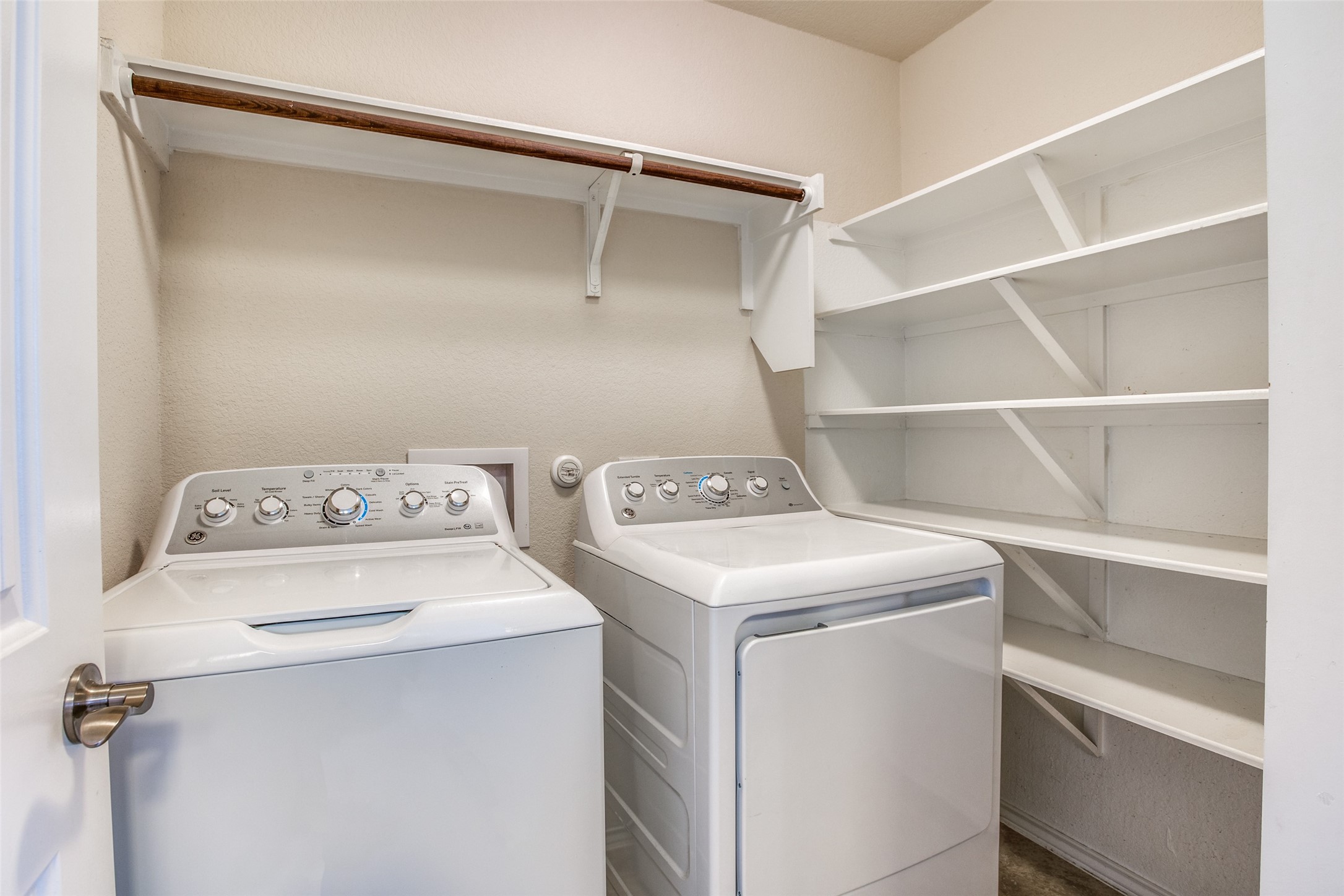 3605 Alpine Autumn Drive Austin, TX 78744 - Photo 14 of 25 a utility room with dryer and washer