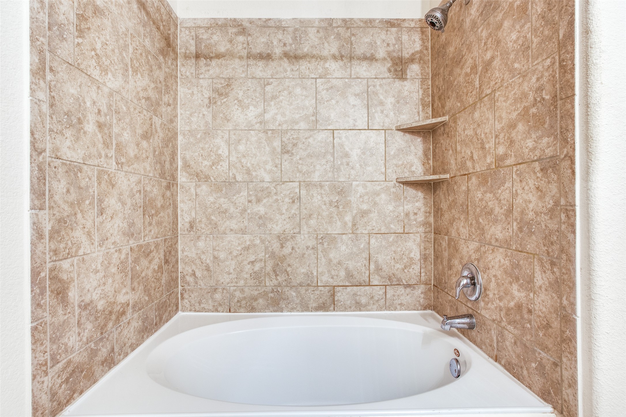 3605 Alpine Autumn Drive Austin, TX 78744 - Photo 17 of 25 a bathroom with a bathtub
