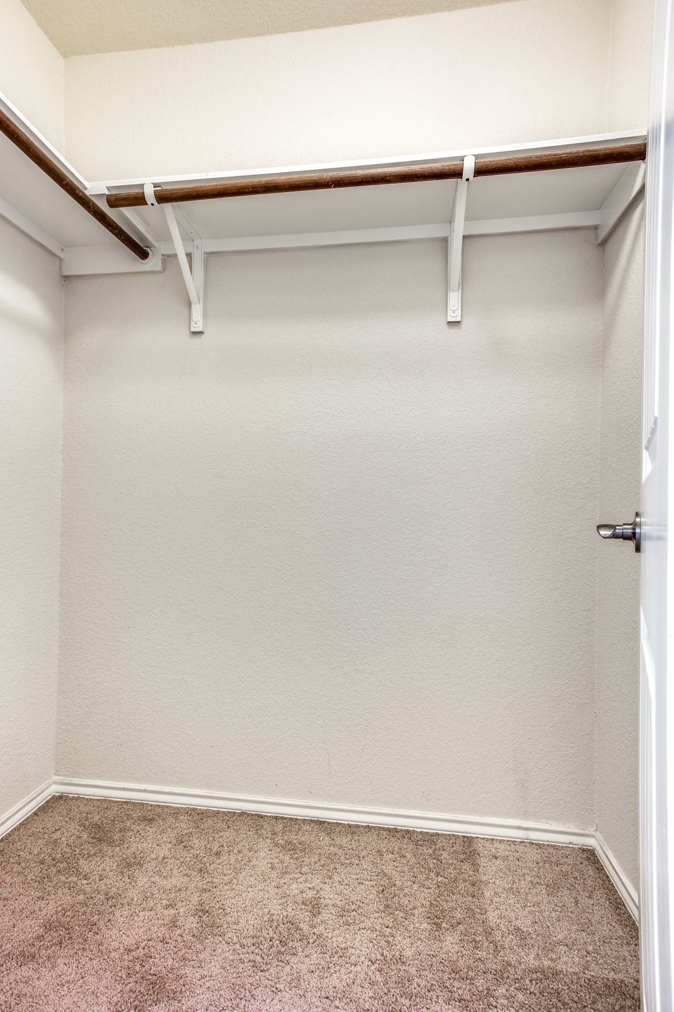 3605 Alpine Autumn Drive Austin, TX 78744 - Photo 18 of 25 a view of an empty walk in closet
