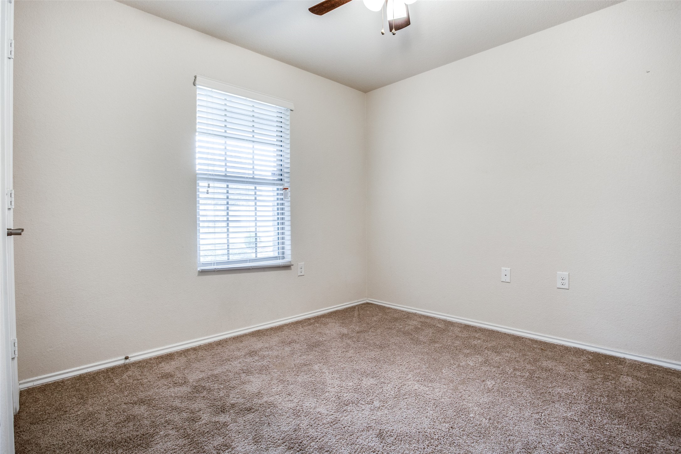 3605 Alpine Autumn Drive Austin, TX 78744 - Photo 20 of 25 an empty room with a window