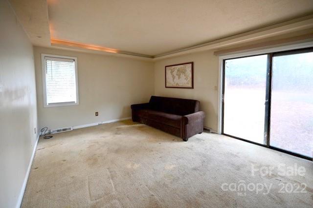4164 Koala Circle Tega Cay, SC 29708 - Photo 12 of 23 a living room with furniture and a window