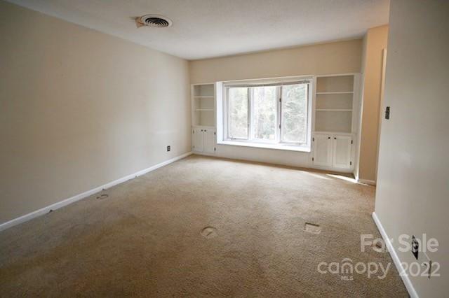 4164 Koala Circle Tega Cay, SC 29708 - Photo 13 of 23 a view of an empty room with a window